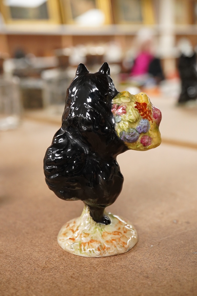 A Beatrix Potter F Warne and Co Ltd, Beswick figure of “Duchess” with flowers, gold stamp to base. 10cm high